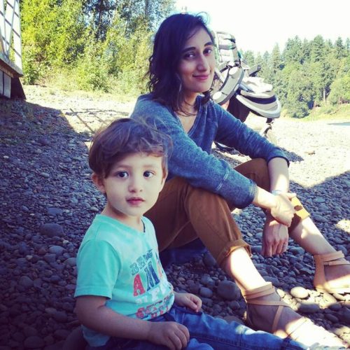 Pranjali sitting with her son