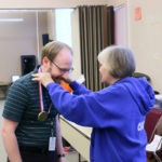 Dan Sorensen receives his service award from board member Ann Campbell