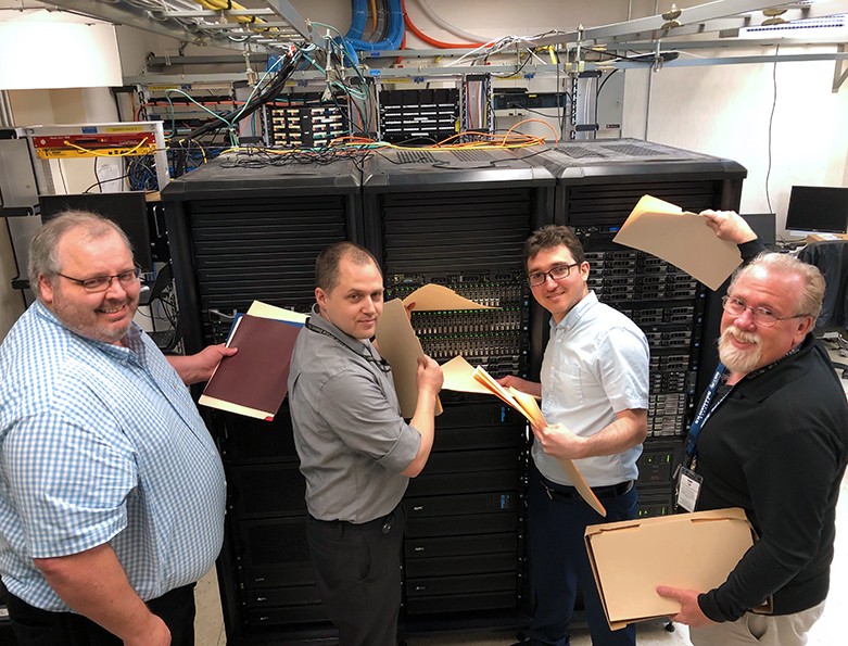 This year the IT Team moved 14 million email messages and 950,000 files from the ESD server to the Office 365 cloud. We caught Information Technology Director Curtis Ellis, senior server engineer Dietrich Hildebrandt, network engineer Hector Vargas and computer/software support technician Don Wells moving some special files into the cloud.
